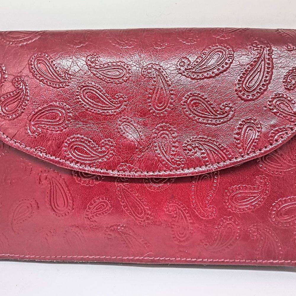 Vintage hand tooled red leather clutch